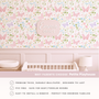 Custom baby name sign Emma Grace on butterfly floral wallpaper, pastel nursery decor with crib, personalized girls room design