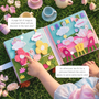 “Princess themed quiet book open to a colourful tea party and garden scene with detachable felt pieces, flowers and play food for pretend play and storytelling.”