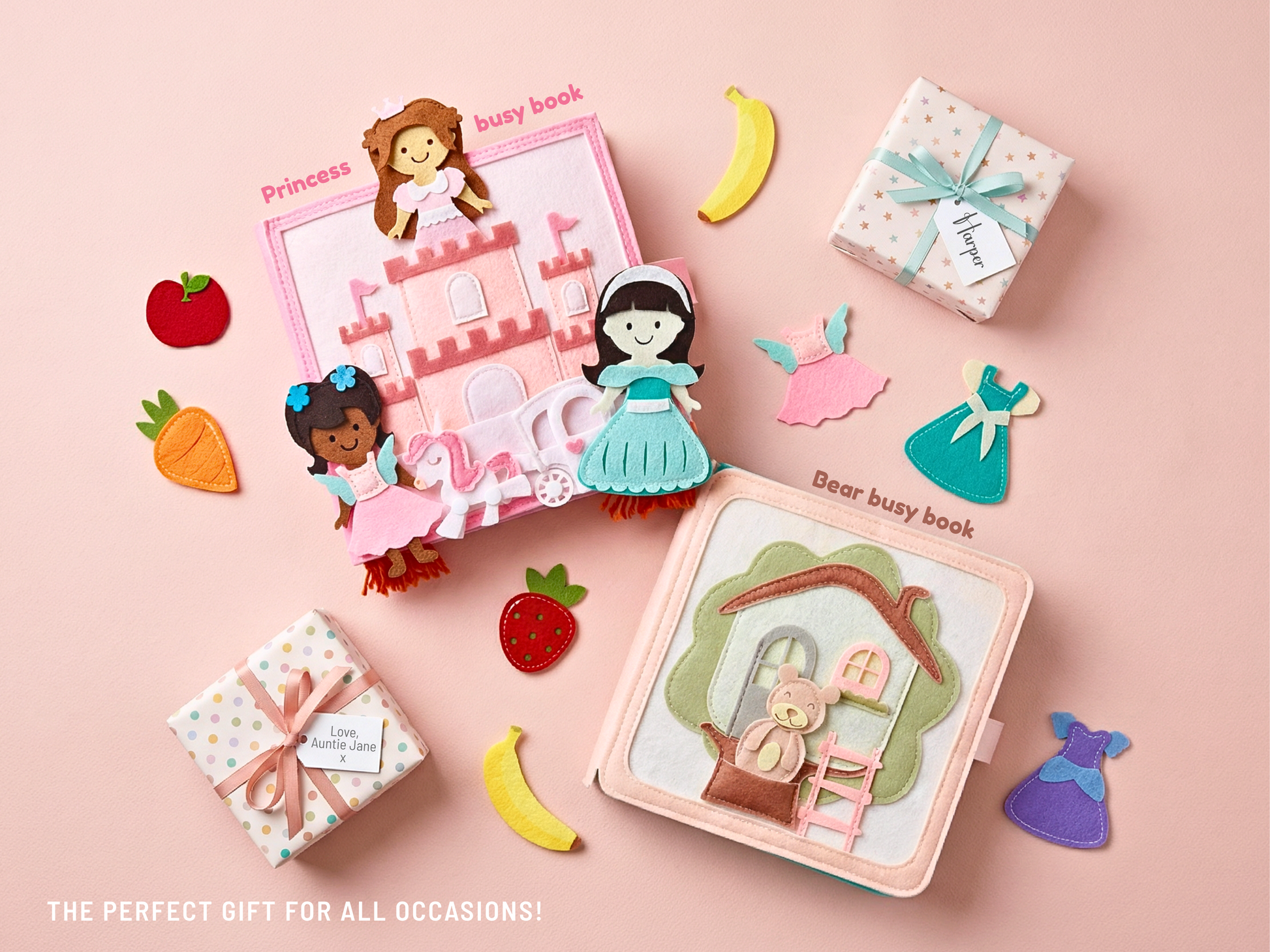 Princess and bear Montessori busy book gift set displayed on a soft pink background, featuring two handmade felt quiet books surrounded by pretend play pieces, dresses, fruit shapes, and wrapped gift boxes, styled as a thoughtful toddler gift for birthdays, holidays, and special occasions.