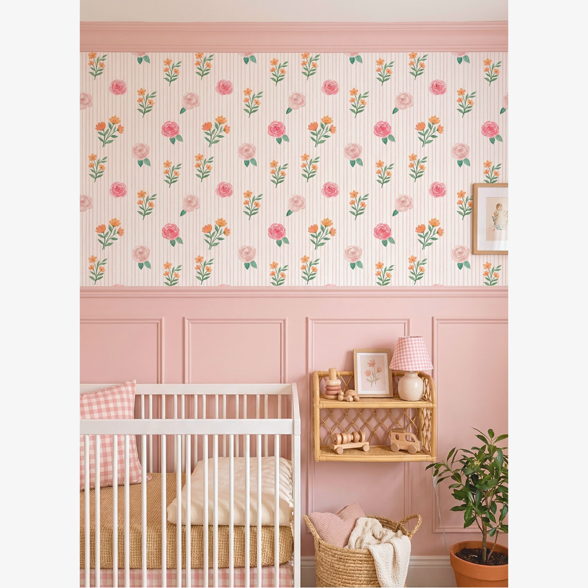 Nursery room with floral wallpaper, pink walls, and a crib.